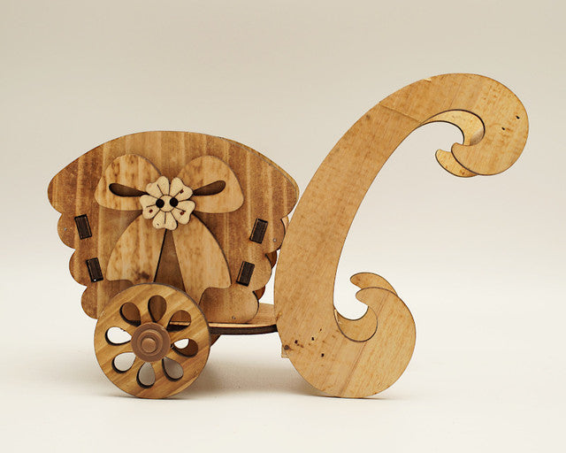 8.5" x 6.5" Brown Wooden Laser-Cut Carriage with Movable Wheels - 1 Centerpiece