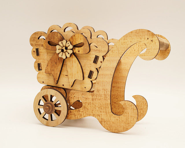 7.5" x 5.5" Brown Wooden Laser-Cut Carriage with Movable Wheels - 1 Centerpiece