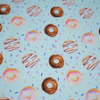 Dancing Doughnuts Printed Nylon Spandex Fabric - Blue Doughnut Print, 55/56" Width (1 Yard)