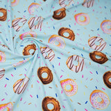 Dancing Doughnuts Printed Nylon Spandex Fabric - Blue Doughnut Print, 55/56" Width (1 Yard)
