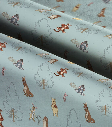 Quilting Cotton Disney Winnie the Pooh Group on Blue