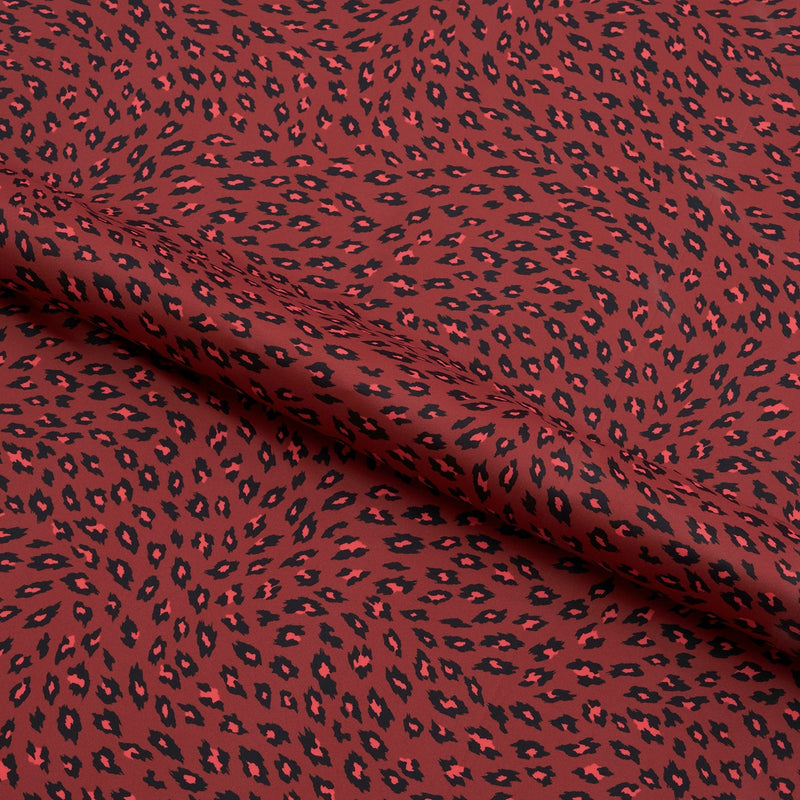 Printed Spandex Fabric Black on Red Cheetah