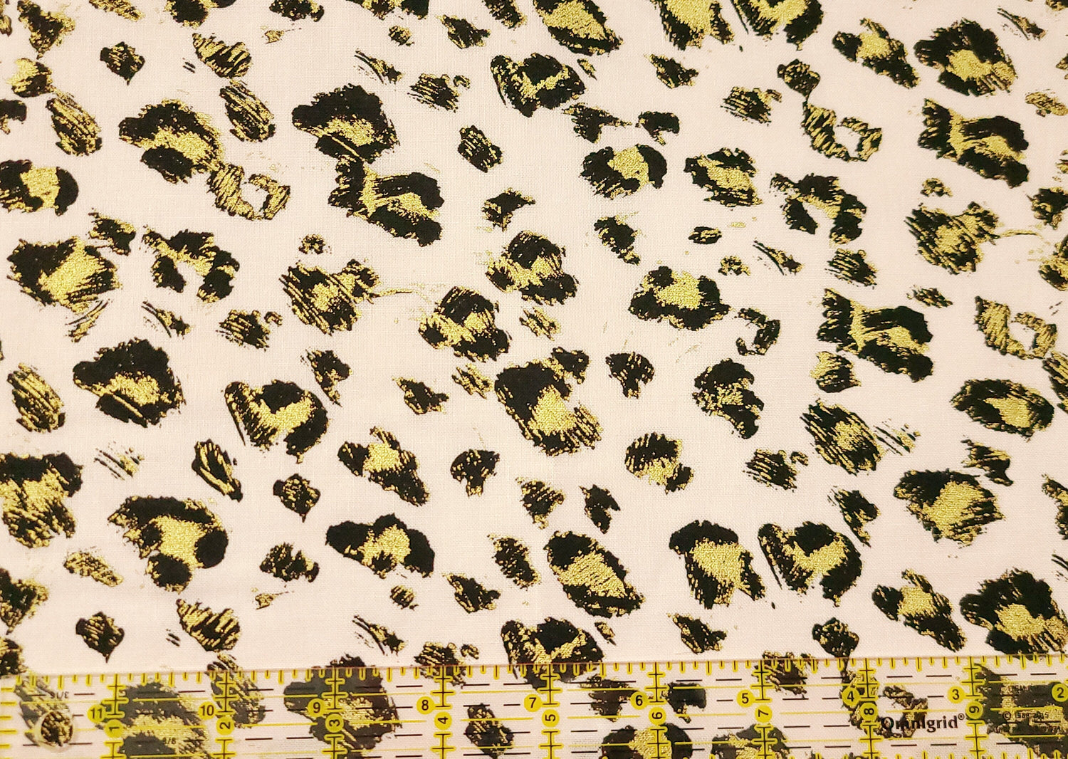 Quilting Cotton Gold Leopard on Pink
