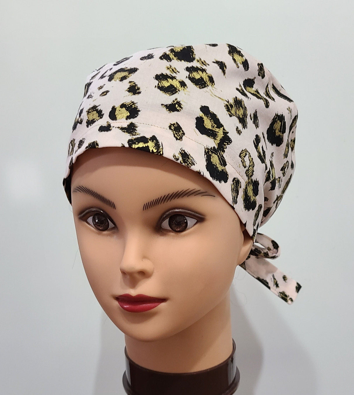 Quilting Cotton Gold Leopard on Pink