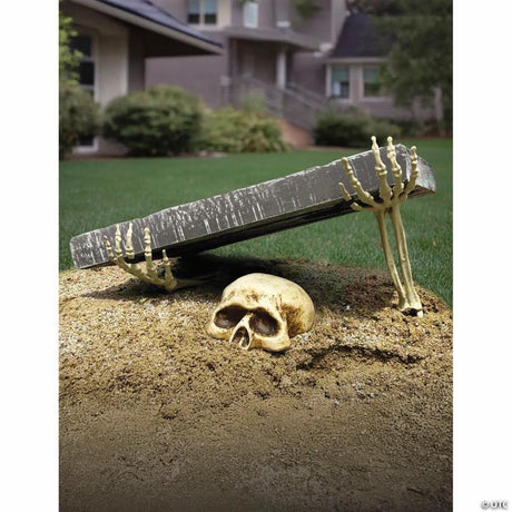 RADYAN Grave Outdoor Headstone with Skull and Skeleton Arms Halloween Decoration shown in a clear product image