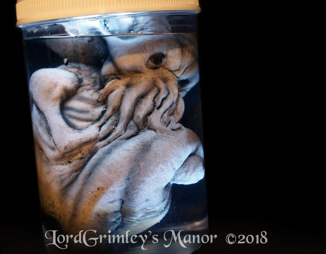 white Cthulhu Spawn specimen jar horror prop