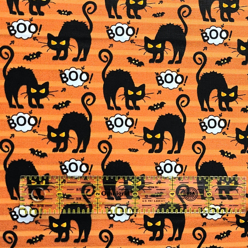 Quilting Cotton Angry Cat on Orange Halloween Fabric