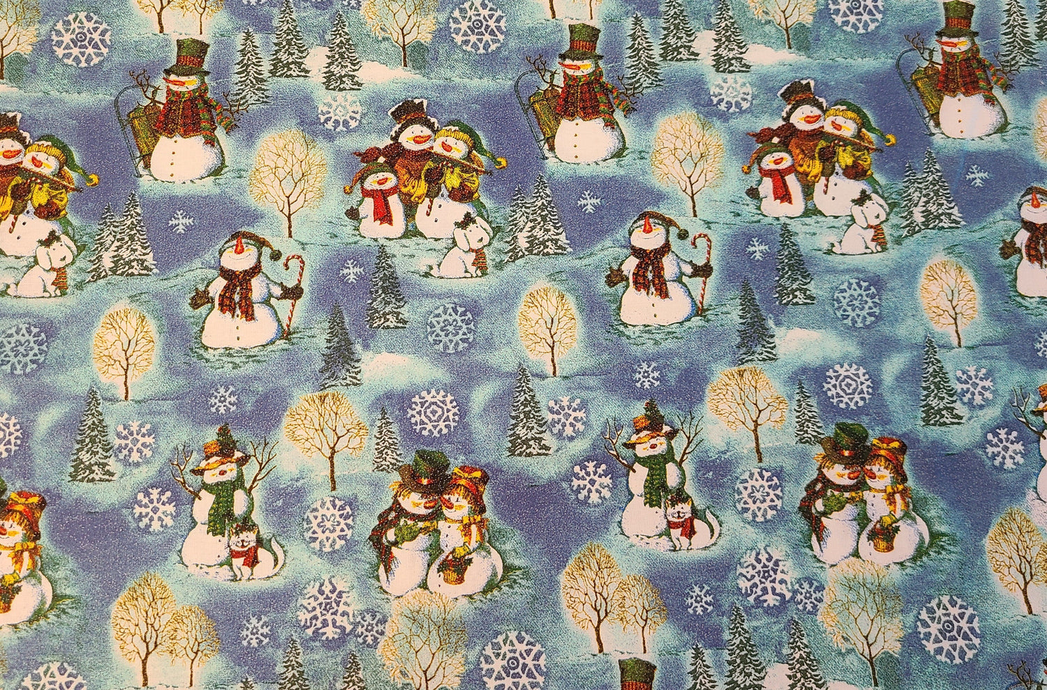 Quilting Cotton Happy Snowman Family on Blue Timeless Treasures