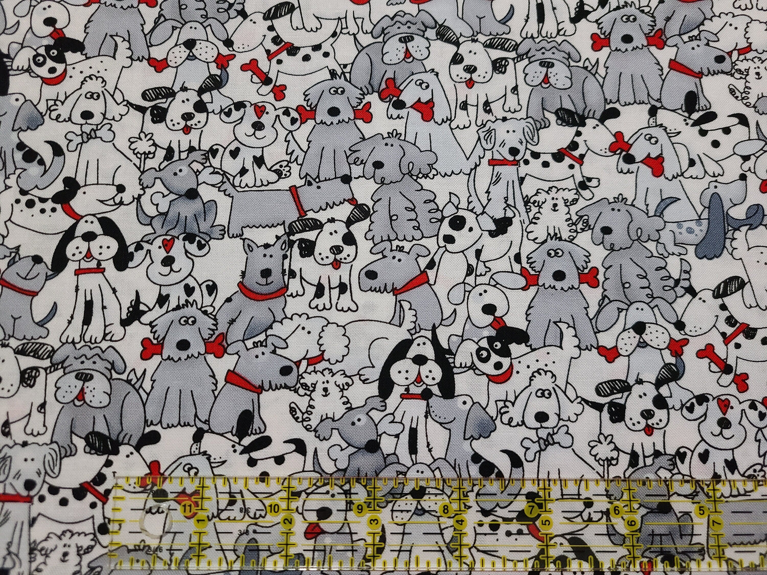Quilting Cotton Playful Pups with Bones Novelty Fabric