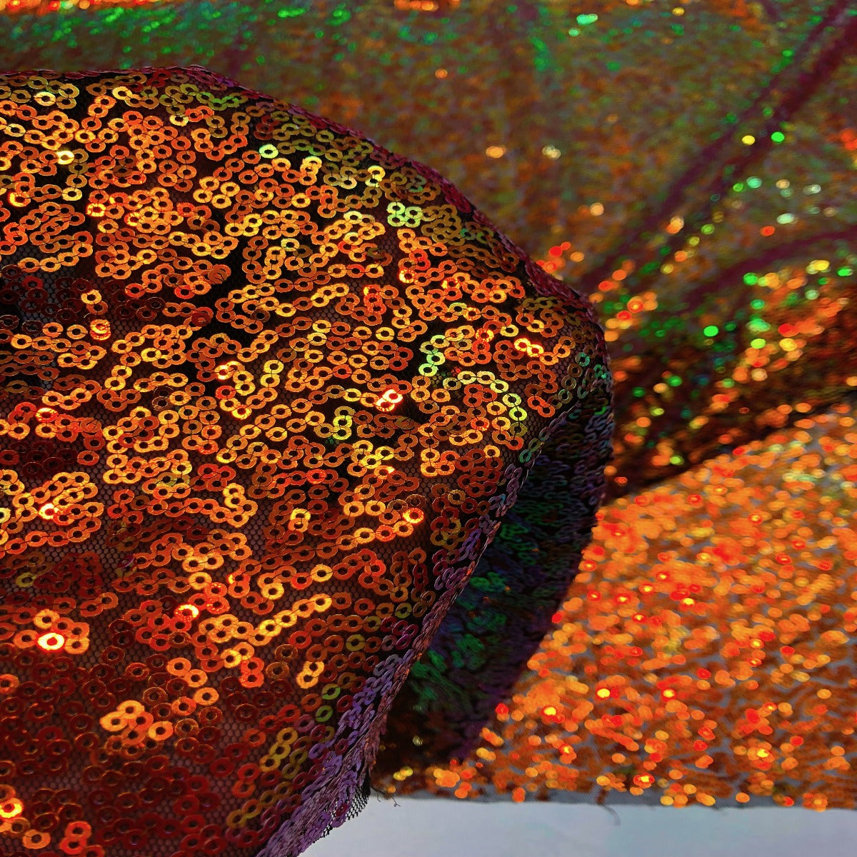 Iridescent All Over Sequins Polyester Fabric - Orange Iridescent, Black Mesh, 60" Width (1 Yard)