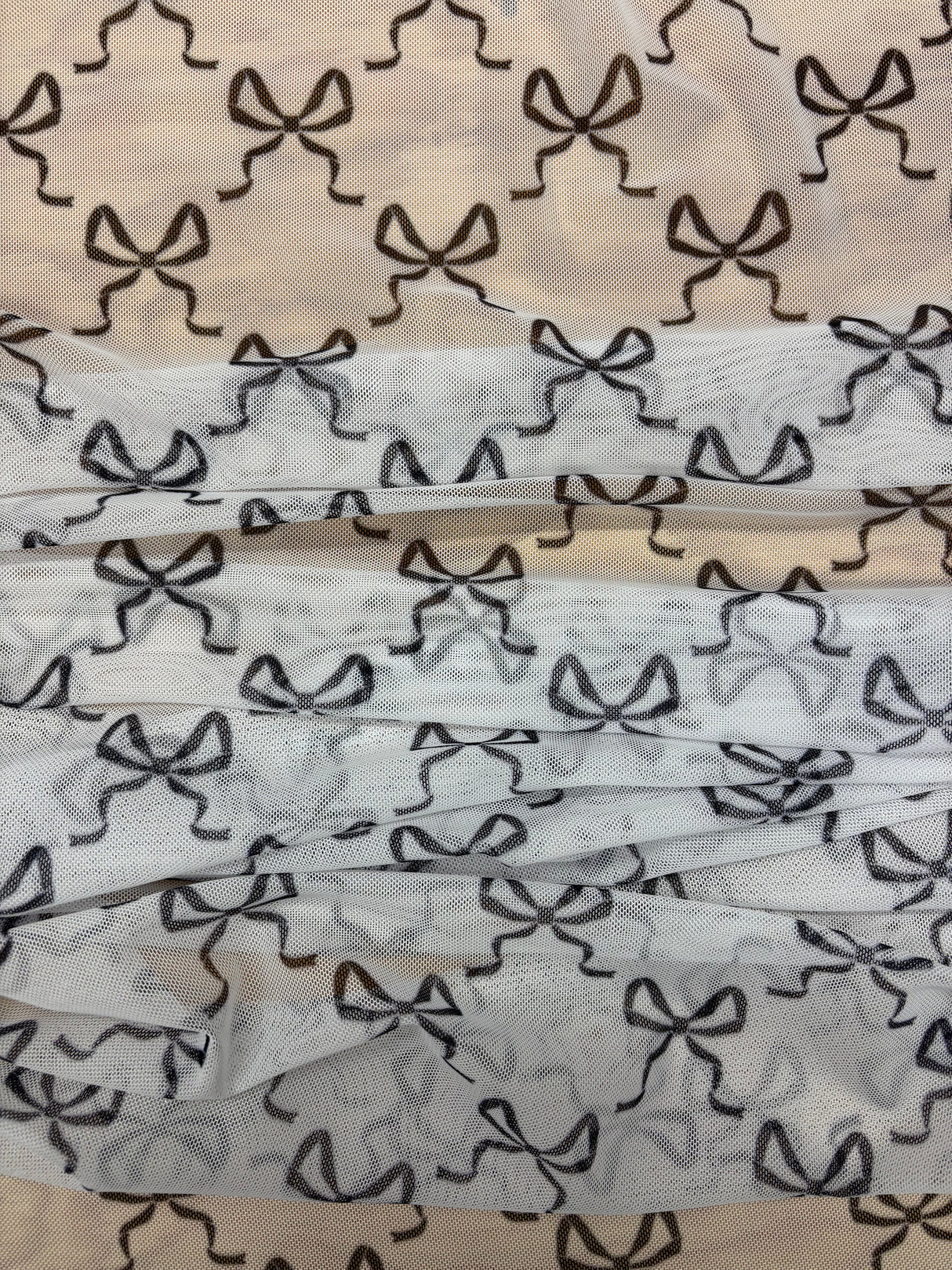 Bow Print Mesh Stretch Mesh Fabric - Black, Red Bow Print, Four-Way Stretch (1 Yard)