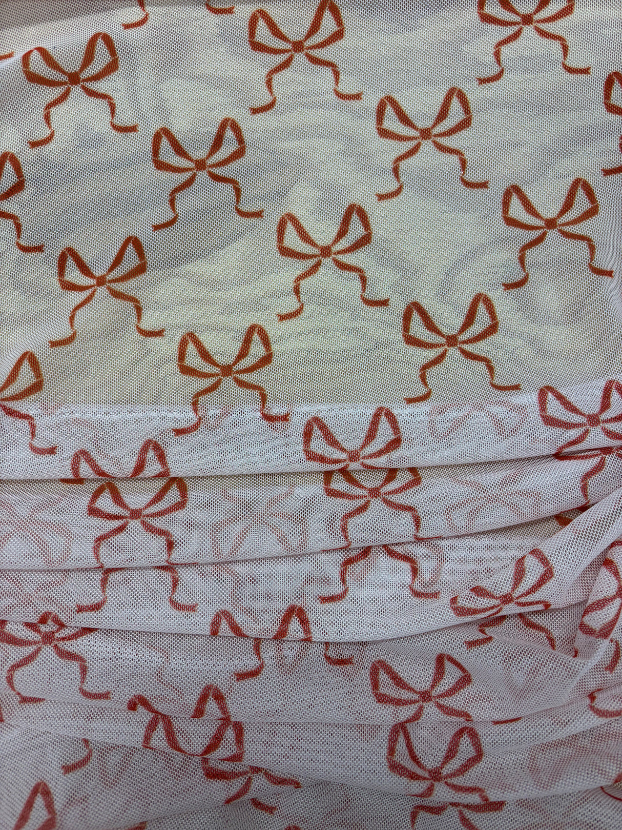 Bow Print Mesh Stretch Mesh Fabric - Black, Red Bow Print, Four-Way Stretch (1 Yard)