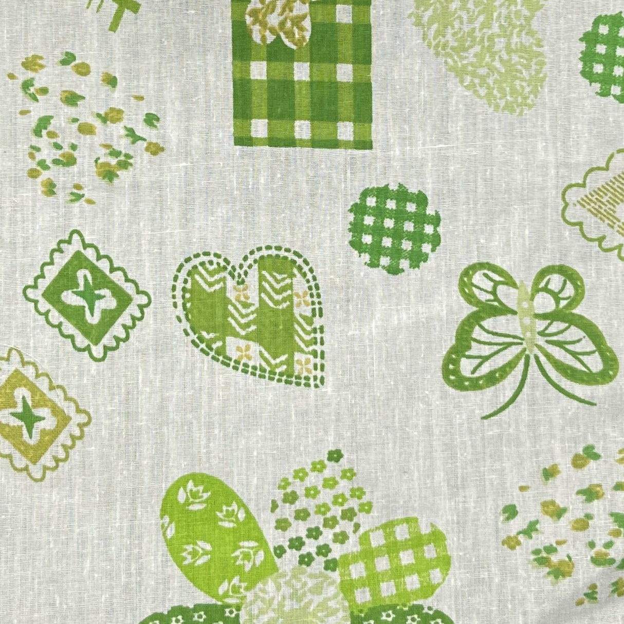 Patches on Green Poly Cotton Fabric,