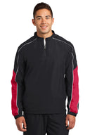 Camiseta cortavientos colorblock con ribete y cremallera 1/4 Sport-Tek®.