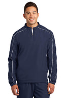 Camiseta cortavientos colorblock con ribete y cremallera 1/4 Sport-Tek®.