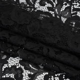 Nylon and Rayon Raschel Lace Panel with Finished Edges - Black Florals and Curls