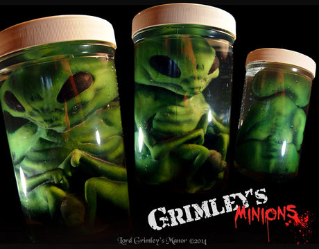 green Area 51 alien embryo jar sci-fi prop