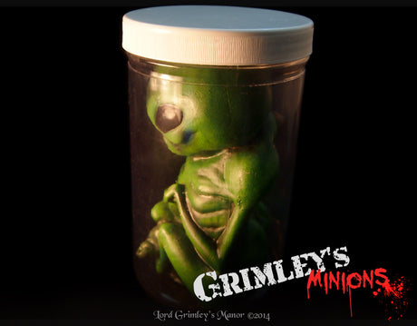 green Area 51 alien embryo jar sci-fi prop