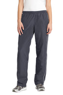 Pantalón cortaviento con ribetes para mujer Sport-Tek®