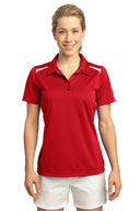 Polo Vector Sport-Wick® para mujer Sport-Tek®