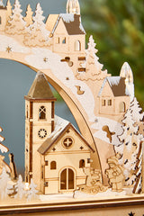 14.75 inch Lighted Laser Cut Wood Village Scene with Moving Figurine and Candles