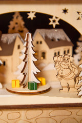 14.75" Lighted Laser Cut Wood Village Scene with Moving Figurine and Candles