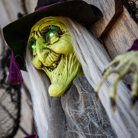 Hanging Animated Witch with Green Eyes Halloween Decoration 4 Ft.