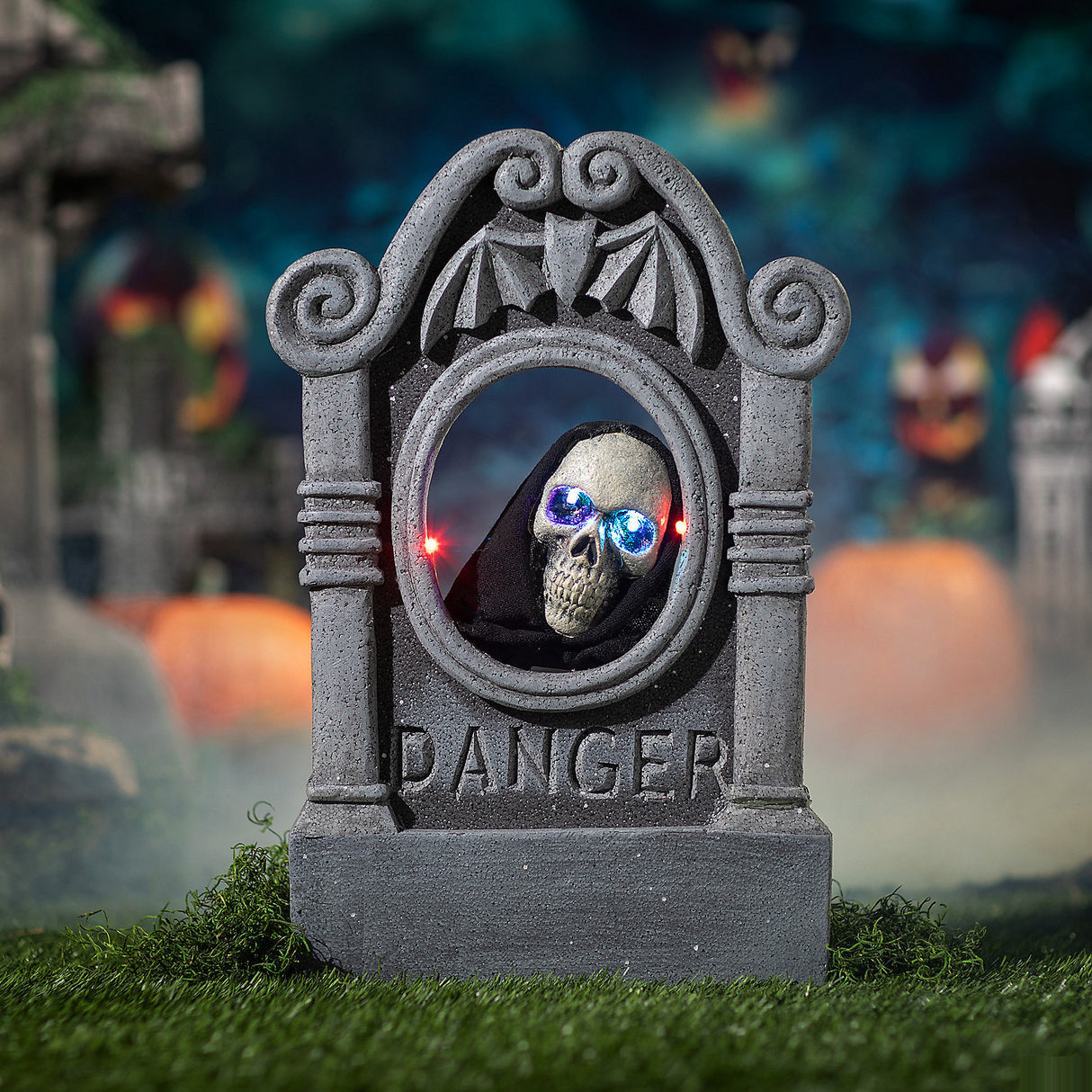 Creepy Gray Tombstone Halloween Decoration with Light-Up Skeleton Head for Outdoor Events and Haunted Houses