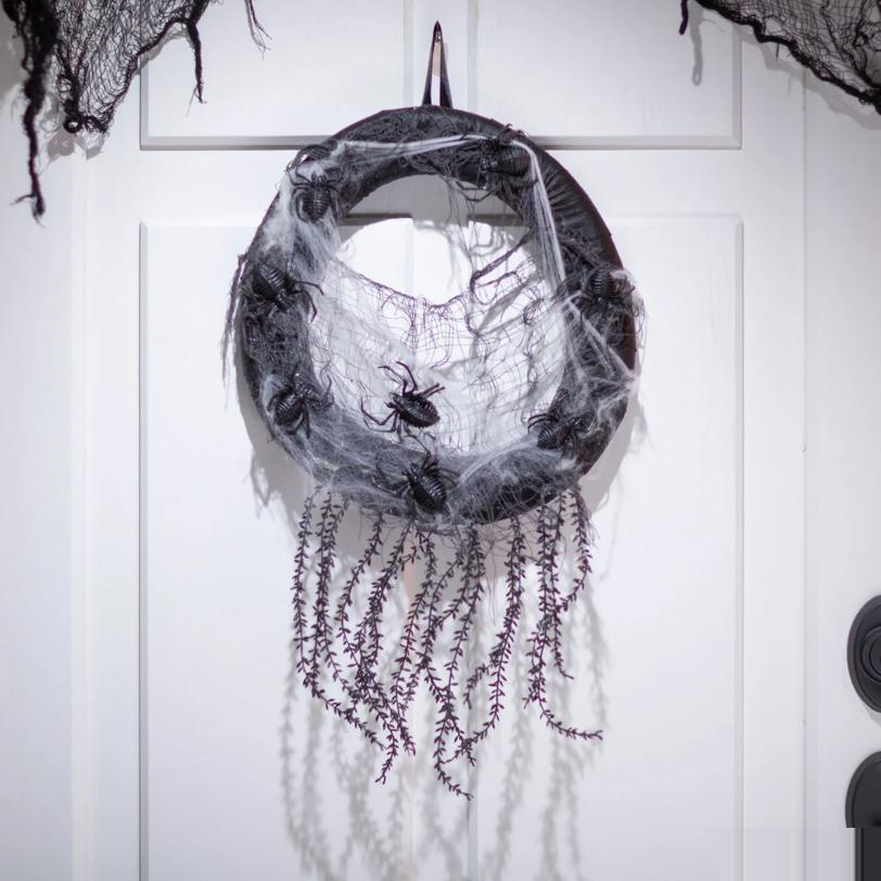 14 3/4" x 23 1/2" Black Wreath with Black Spiders & Spider Webs Halloween Decoration