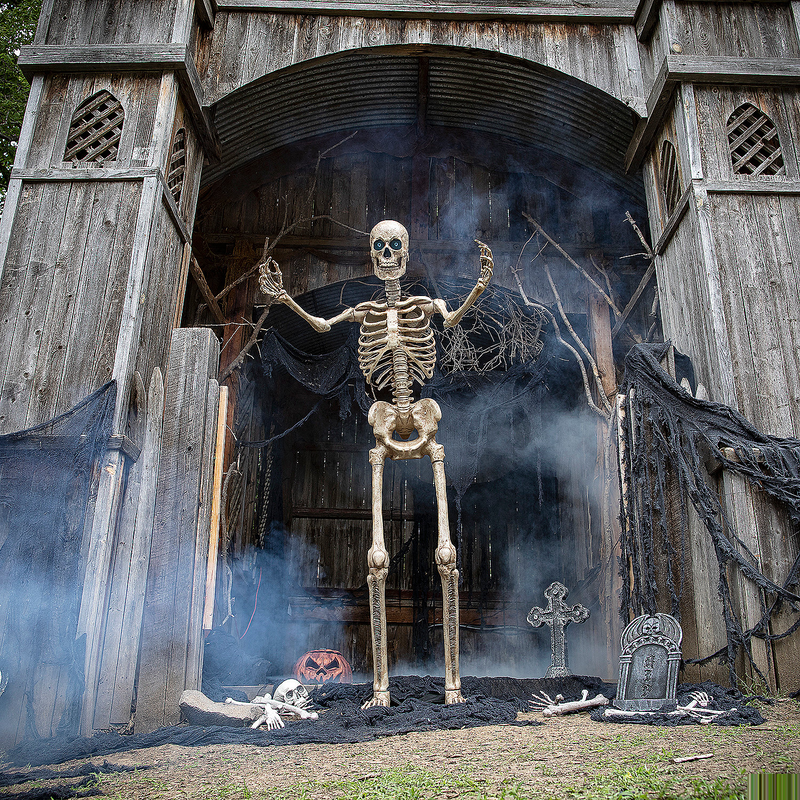 8-Foot Towering Skeleton with Projection Eye for Halloween Decor and Scary Themed Parties