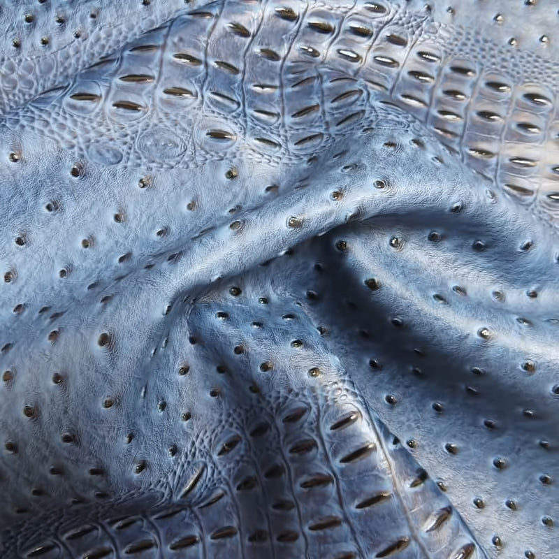 Raging Blue Mutant Ostrich Gator Embossed Vinyl Fabric