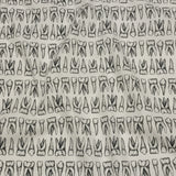 Stretch Cotton Poplin - White and Black Teeth - Berenice Print - Mood Exclusive Nevermore Collection