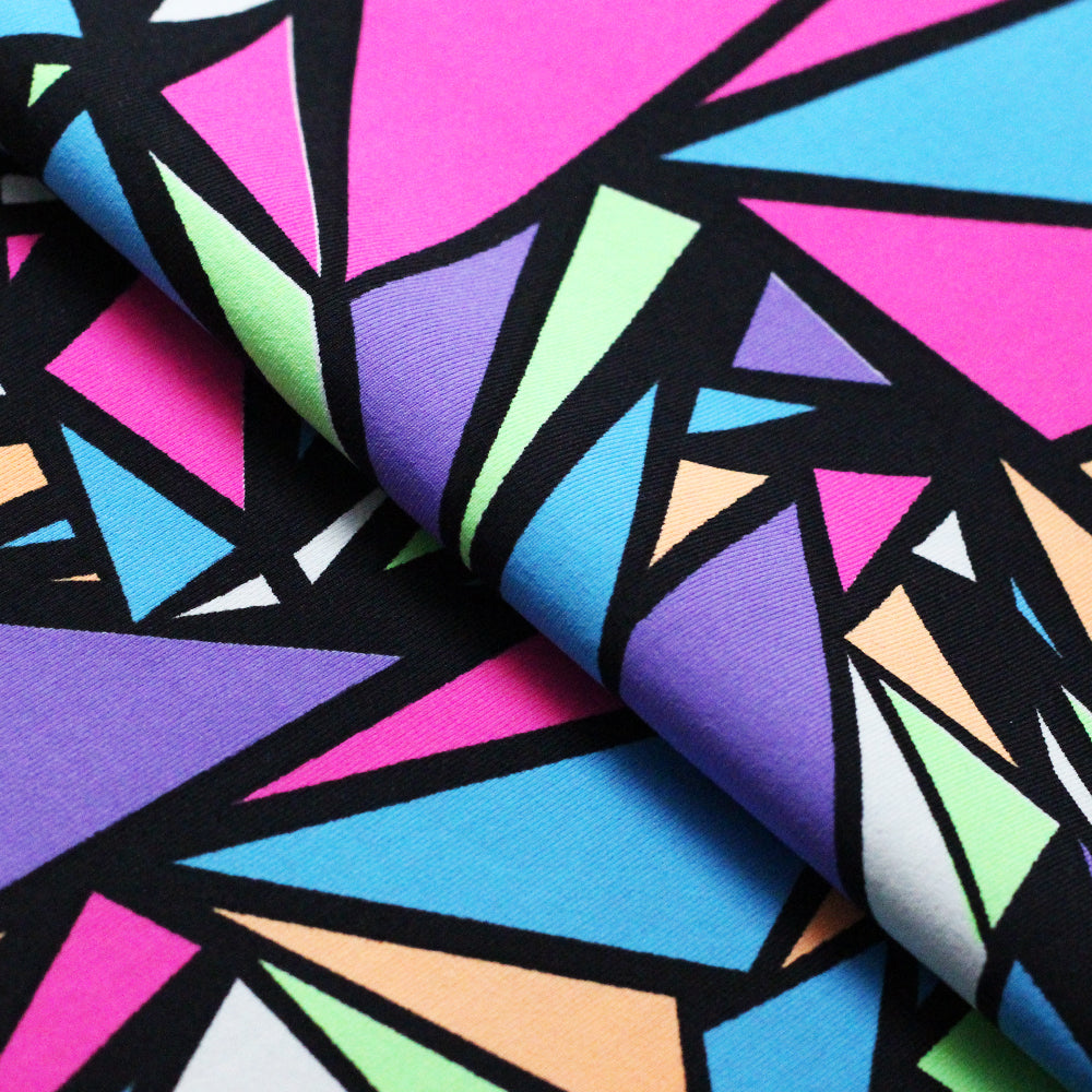 Spin City Nylon Spandex Fabric - Multicolor Geometric Triangles On Black, 58/60" Width (1 Yard)
