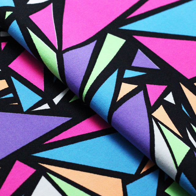 Spin City Nylon Spandex Fabric - Multicolor Geometric Triangles On Black, 58/60" Width (1 Yard)