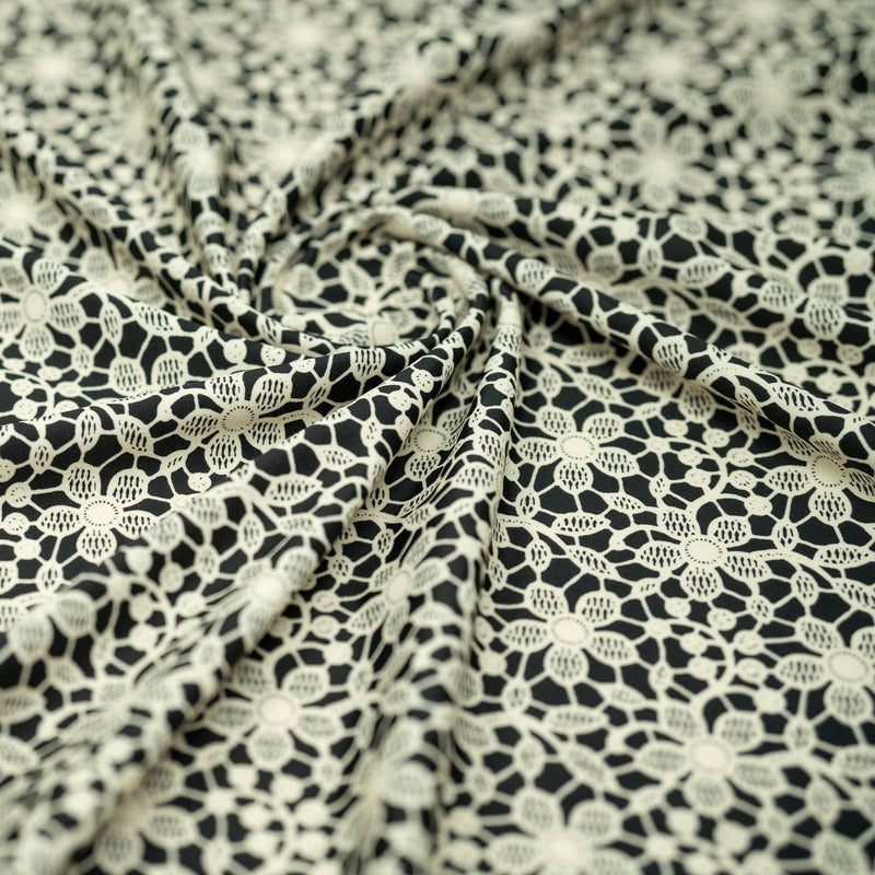 Ivory Flower Lace Pattern On Black Nylon Spandex Fabric - Black, Ivory Floral Lace Pattern, 55/56" Width (1 Yard)