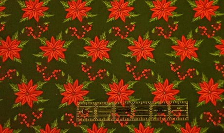 Quilting Cotton Poinsettia Flowers on Green Christmas Fabric