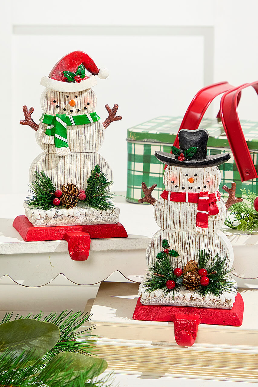 8.25" Snowman Stocking Holder with Pine And Berry Accent