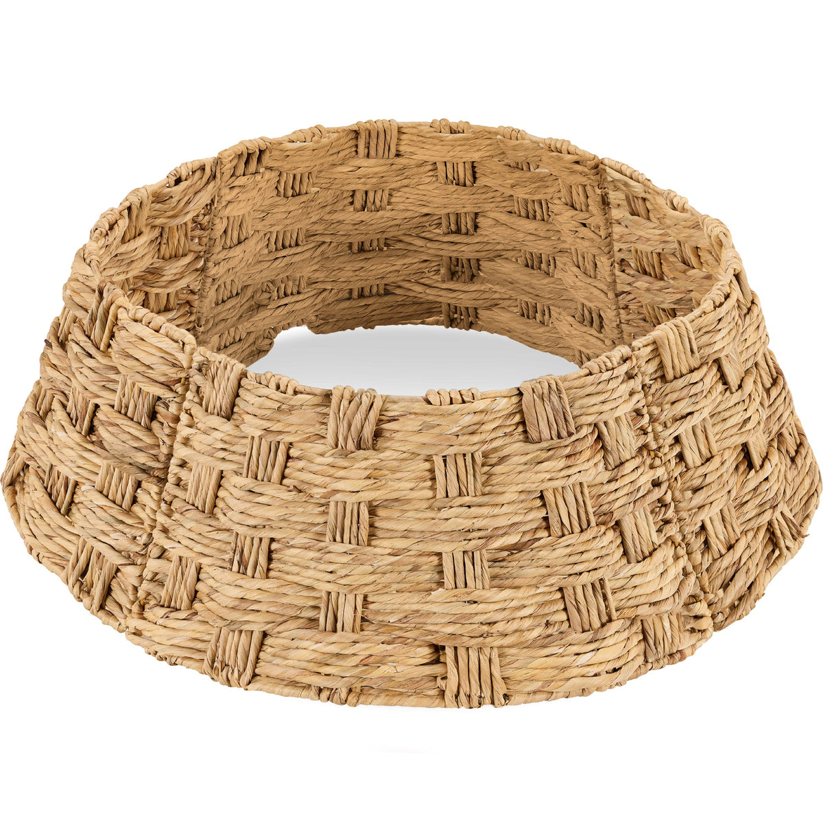 Woven water hyacinth Christmas tree collar with modern basketweave design under a tree