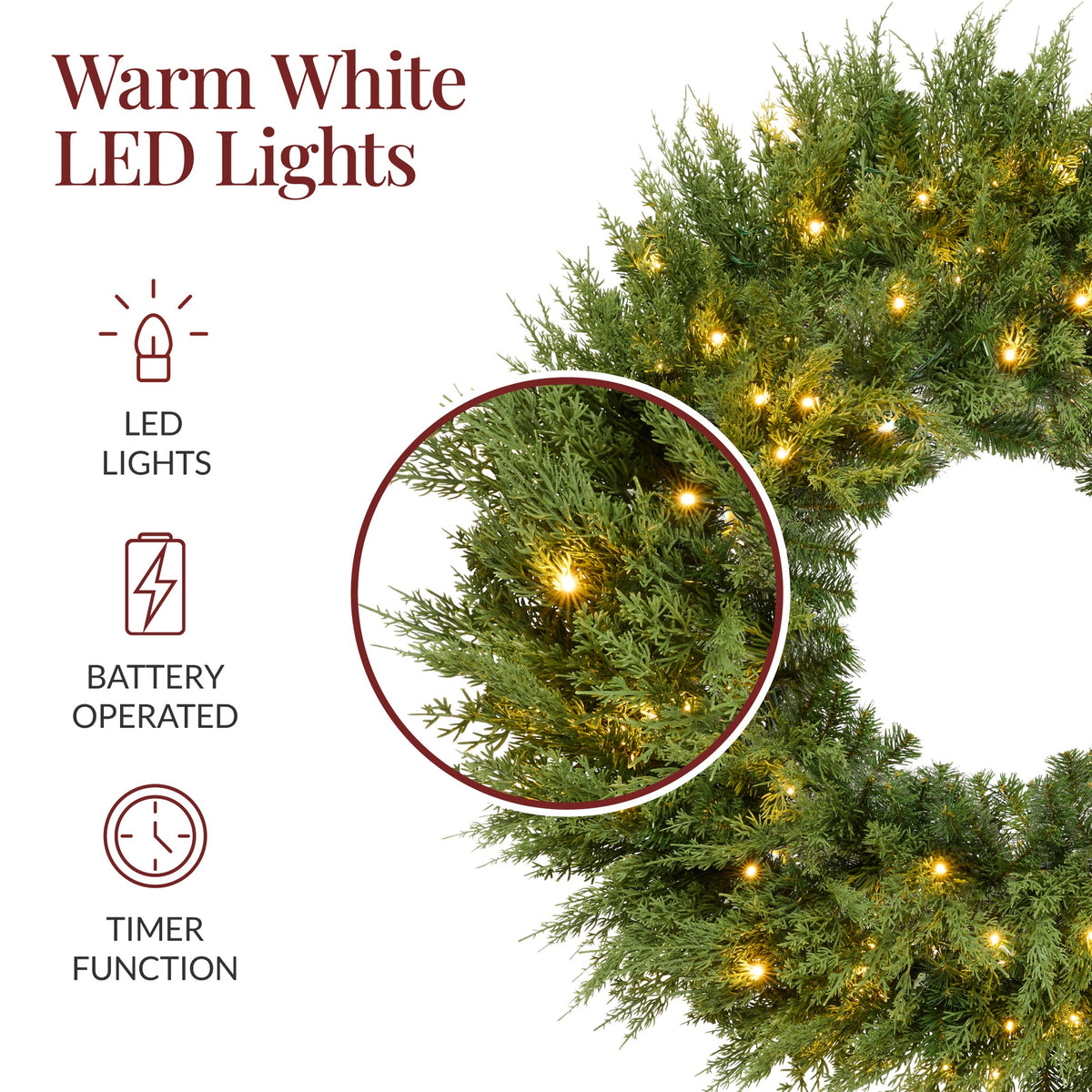 Pre-lit cedar cypress Christmas wreath glowing with twinkling LED lights on front door
