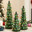 Set of XL pre-lit ceramic tabletop Christmas trees with LED lights displayed together