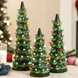 Set of XL pre-lit ceramic tabletop Christmas trees with LED lights displayed together