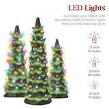Set of XL pre-lit ceramic tabletop Christmas trees with LED lights displayed together