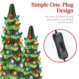 Set of XL pre-lit ceramic tabletop Christmas trees with LED lights displayed together