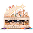 Wooden shooting star Christmas advent calendar with warm LED light hanging on a festive wall display