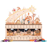 Wooden shooting star Christmas advent calendar with warm LED light hanging on a festive wall display