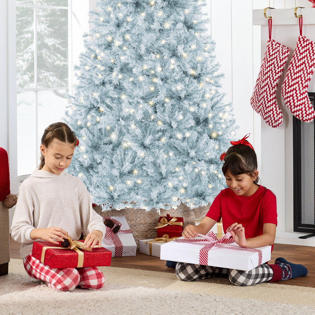 Pre-Lit Artificial Christmas Tree with Cozy String Light Glow product image showing its overall design and key features.