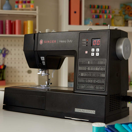 SINGER Heavy Duty 6600C Sterling Sewing Machine - Computerized Heavy Duty Sewing Machine, 215 Stitch Applications, 6.4" Throat Space, Silver (1 Unit)