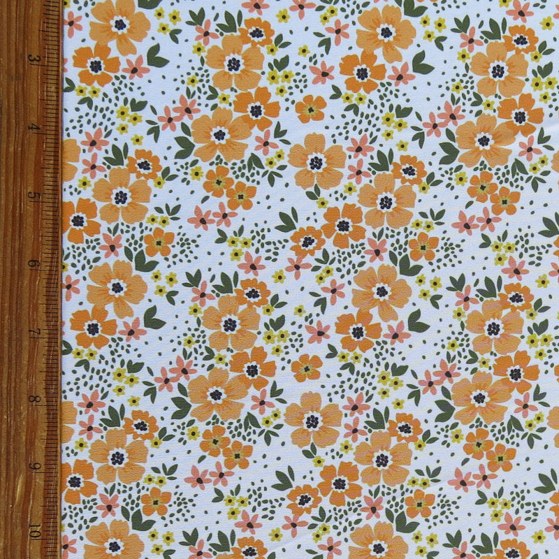 Swim Knit Tangerine Daisies on White Poly Spandex