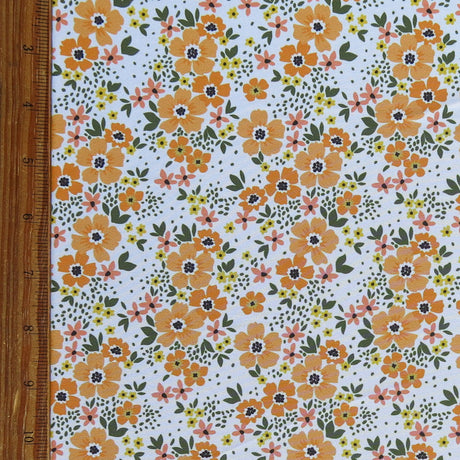 Swim Knit Tangerine Daisies on White Poly Spandex
