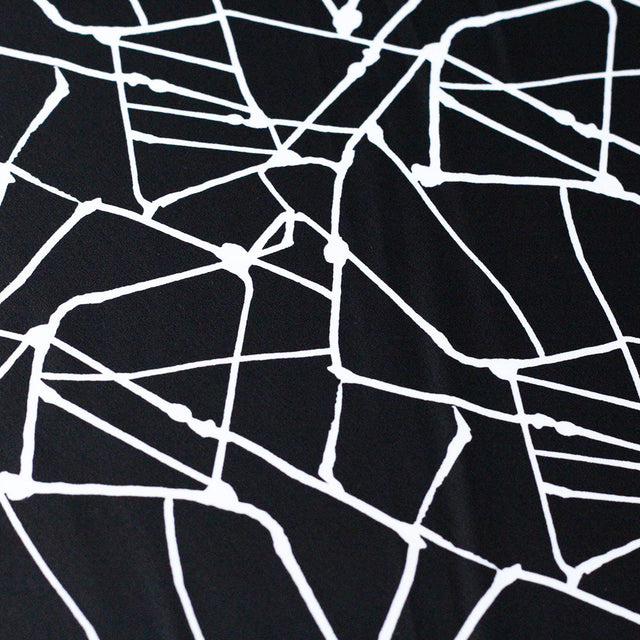Unleaded Polyester Spandex Fabric - Black/White Geometric, 58/60" Width (1 Yard)